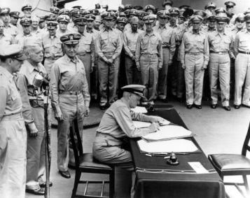 Admiral of the Fleet Chester W. Nimitz at Japanese surrender Behind him stand MacArthur, Halsey and Admiral Forrest Sherman