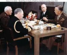 Leahy, left, and King, top right, in conference with Generals George C. Marshall, right, and Henry "Hap" Arnold, top left