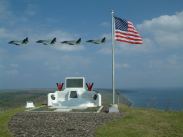 USMC jets pass in tribute the memorial on Mount Suribachi, Iwo Jima